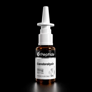 Close-up of a white syringe-like applicator attached to an amber cerebrolysin vial against a black background, highlighting the medical device setup.