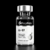 LL 37 5mg Close-up of a glass peptide vial with a metallic cap; label shows 'Peptide', LL-37, 5 mg, purity 99%, for research use only.