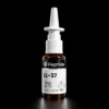 LL 37 Nasal Spray 5mg Close-up of a white syringe-like device above a brown peptide bottle on a black background.