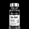 Close-up of a glass bottle with a silver cap; label reads TB-500 peptide, 10 mg, purity ≥99%, for research use only.