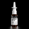 Melanotan II (MT 2) Close-up of a white dispensing syringe attached to a dark-pearl bottle with a Peptide Melanotan II label visible, on a black background.