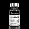 Close-up of a glass peptide vial with a silver cap, black label reading 'Peptide', '10 mg', 'Purity ≥99%', and 'Research use only'.