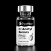 Close-up of a glass peptide bottle with a metallic cap and a black-and-white label reading 'N-Acetyl Semax' and 'RESEARCH USE ONLY' against a black background.