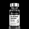 N Acetyl Semax Amidate 55 mg Close-up of a glass bottle with a silver cap and a black label reading 'N-Acetyl Semax', 55 mg, purity ≥99%.