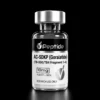 Close-up of a glass vial with a silver cap, black label reading 'Peptide' and white label text for research use only (AC-SDKP/Gorlatide).